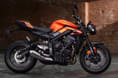 Priced from Rs 10.17 lakh Triumph Street Triple R in orange side profile shot